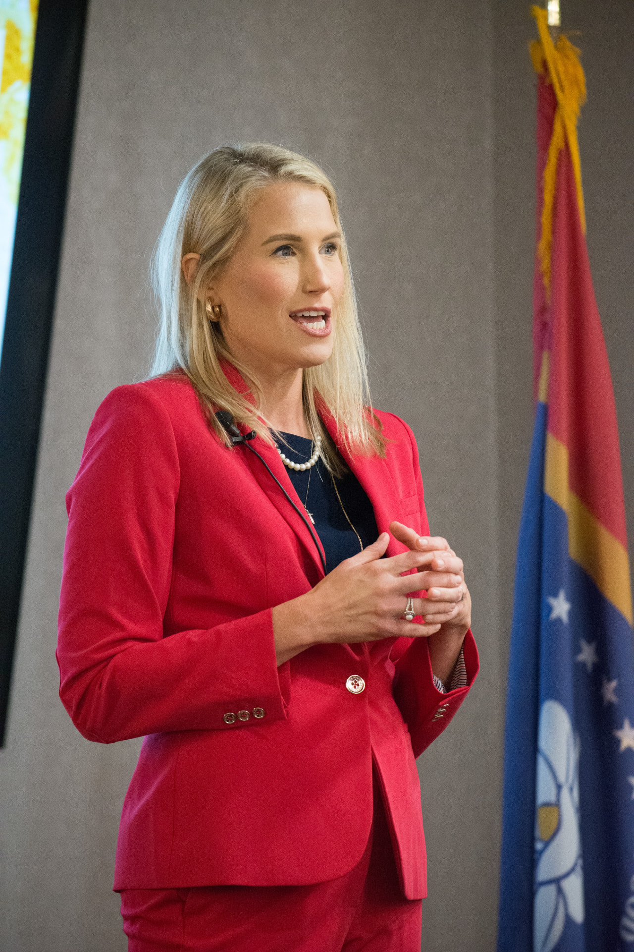 Whitney Lipscomb speaking at an event